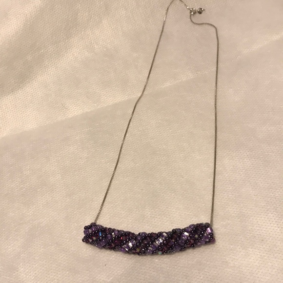 Necklace roll with purple beads. - Picture 2 of 7